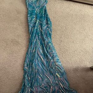 Dress for sale. By Jovani. Size 4 and never been tailored.